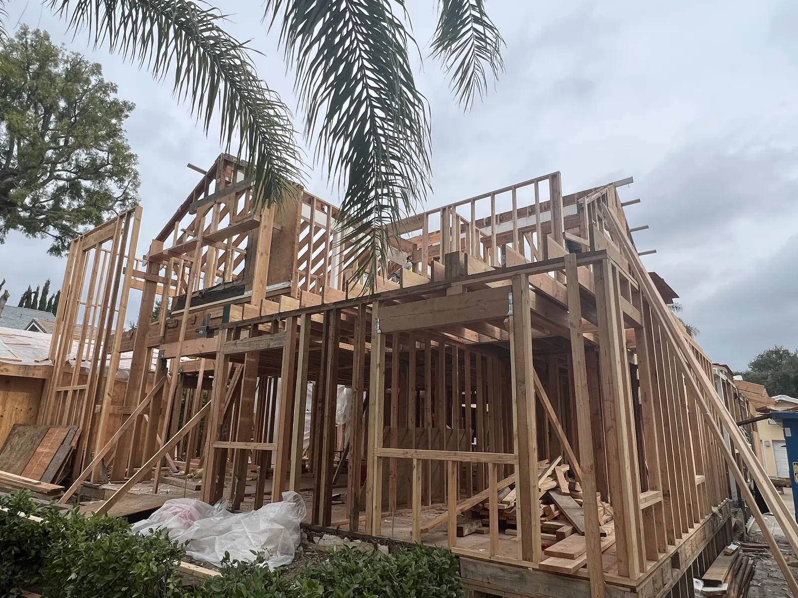 The two-story wood framing skeleton of the new home taking shape at PMK Development's new-construction project in La Cañada Flintridge.