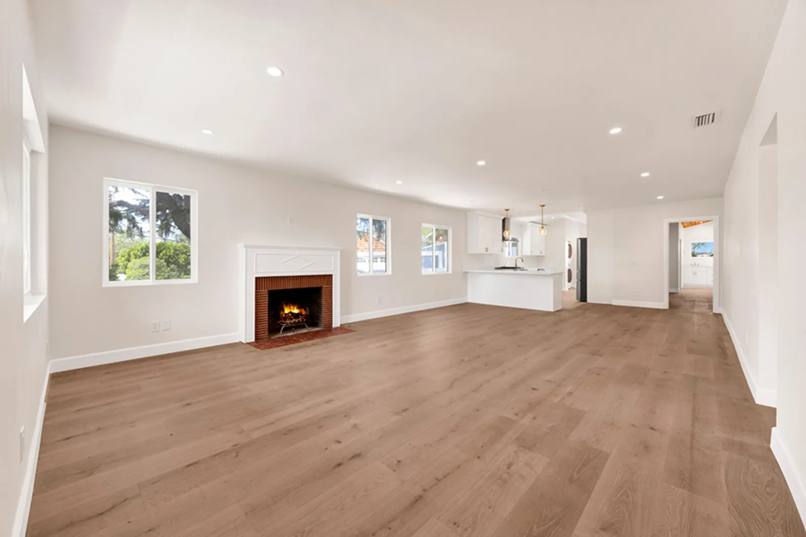 Franklin residence, finished living room with fireplace, open to the kitchen, La Crescenta