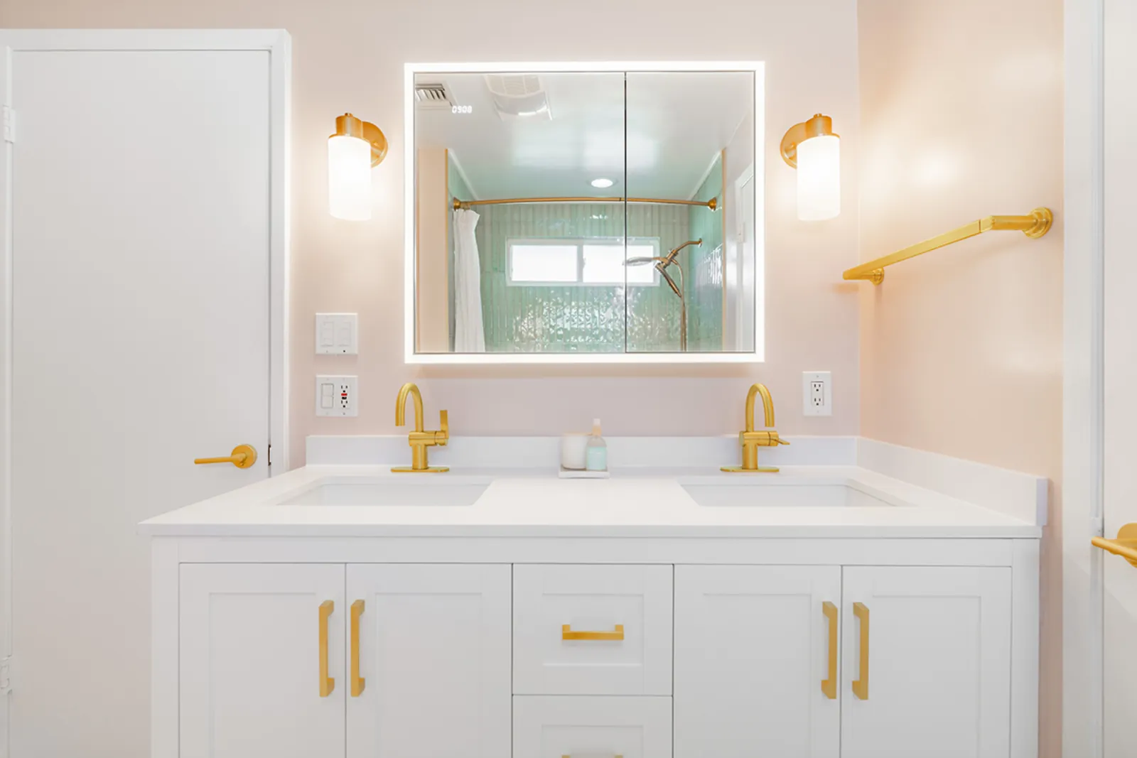 Custom home renovation, vanity mirror reflecting the tiled shower, Burbank, CA