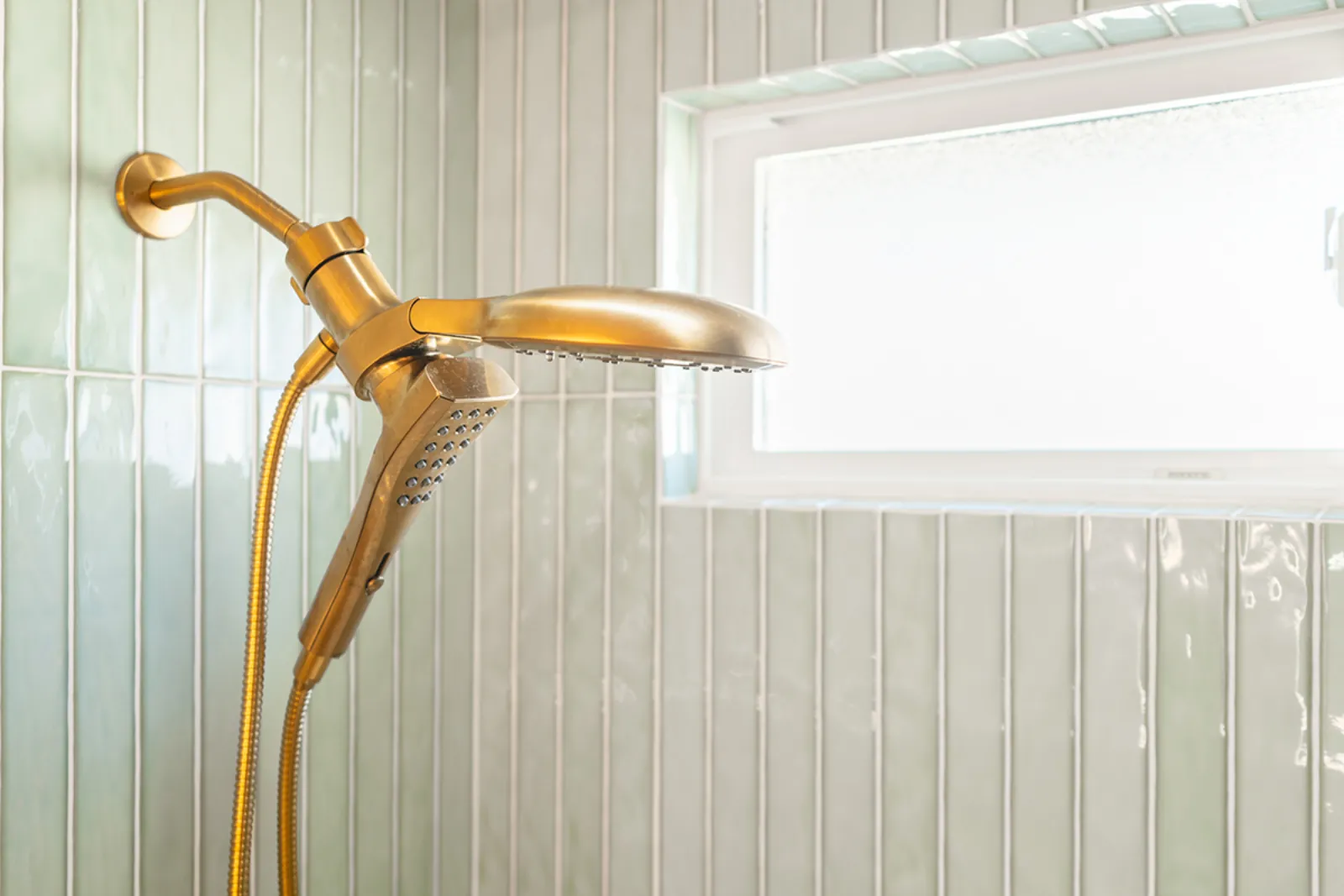 Custom home renovation, brass shower head detail, Burbank, CA