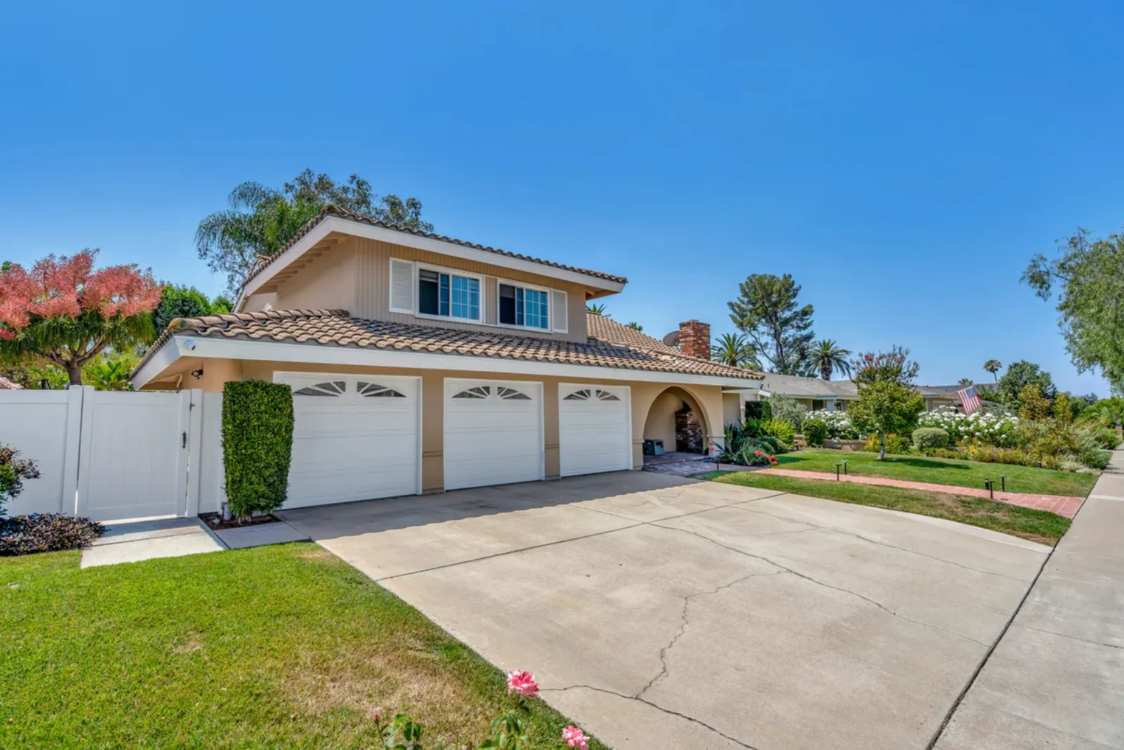 Finished front exterior and driveway from a PMK Development project on Glenwood Avenue in Fullerton