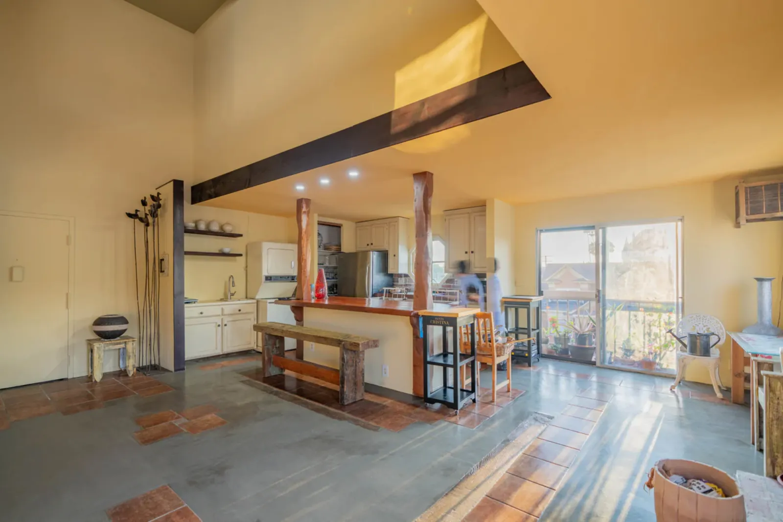 Harvard Ave remodel, open living area and kitchen beneath the loft, Los Angeles