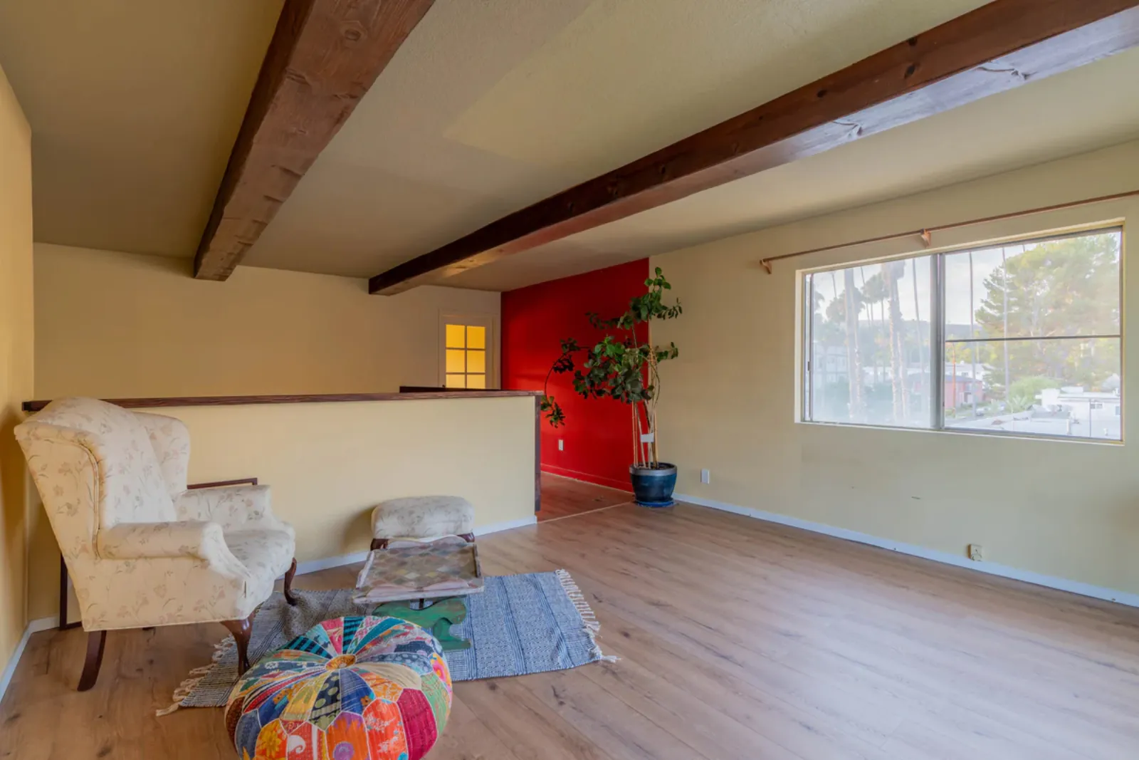 Harvard Ave remodel, loft-level sitting area with new wood flooring, Los Angeles