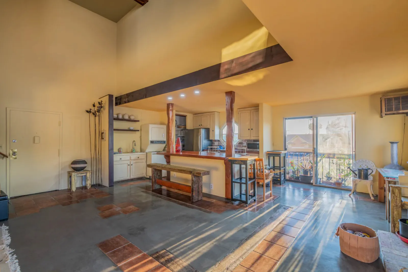 Harvard Ave remodel, kitchen and dining area beneath the exposed beam ceiling, Los Angeles