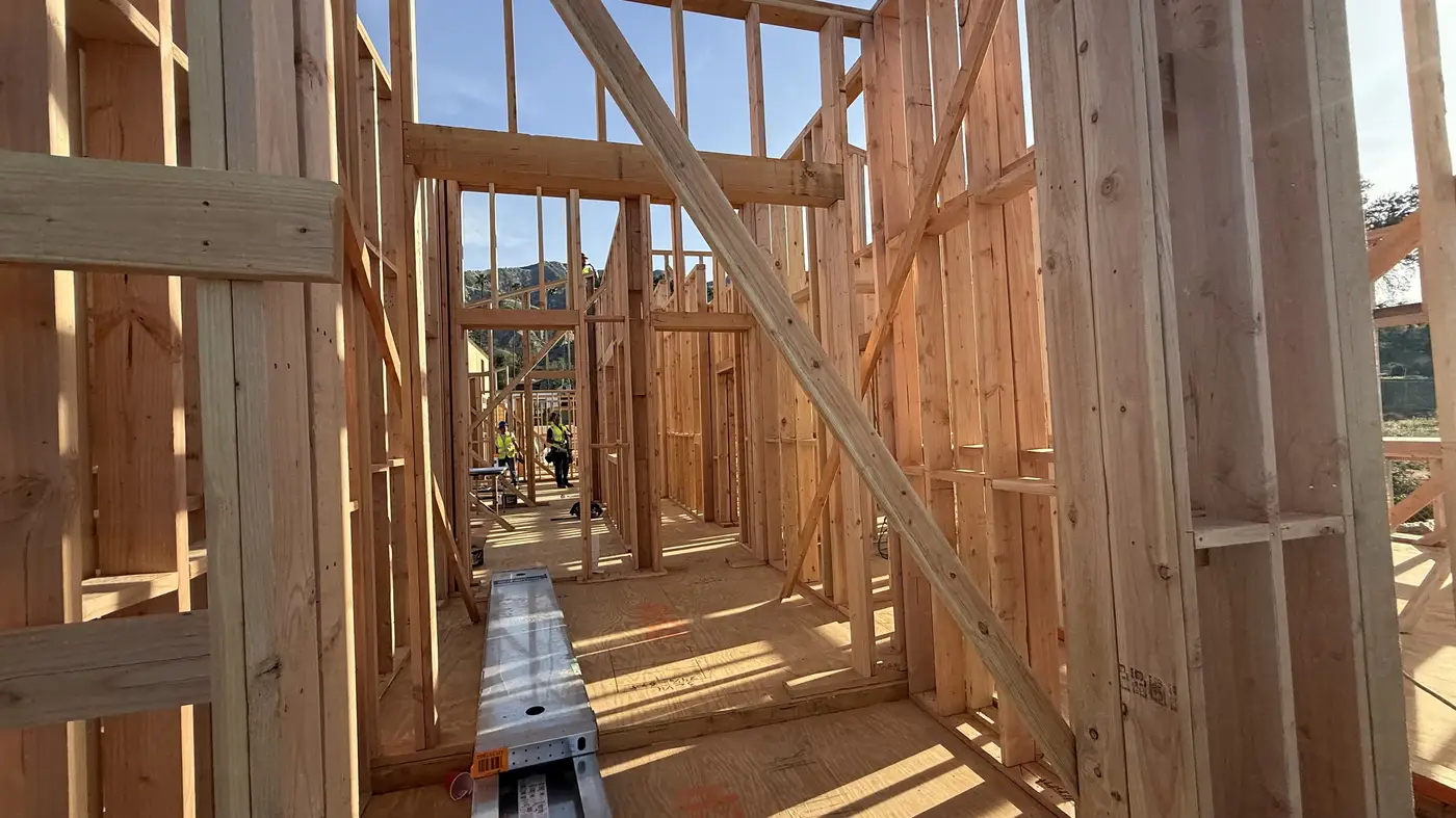 Stud wall framing rising on the ADU and main home at PMK Development's Las Flores Drive rebuild.