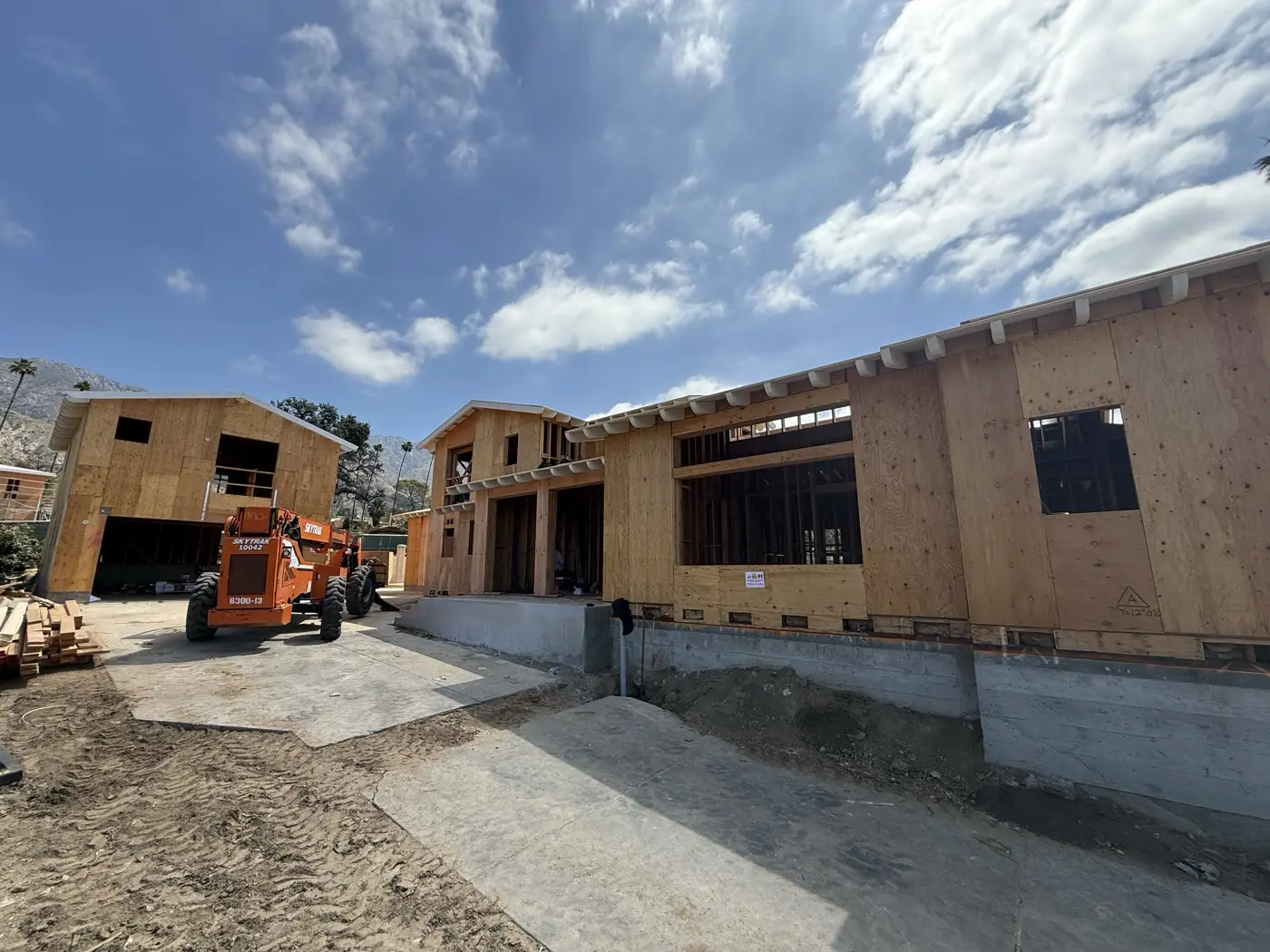 Main home and ADU framed and sheathed side by side at PMK Development's Las Flores Drive rebuild in Altadena.