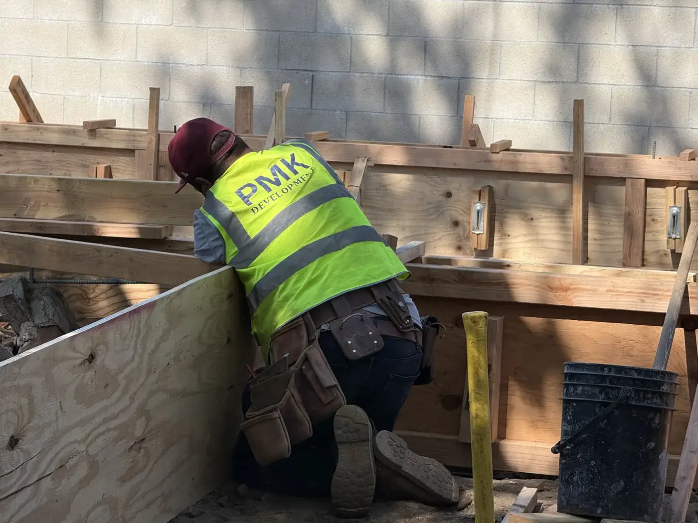 A PMK crew member setting foundation formwork at the Mt. Curve Avenue project in Altadena.