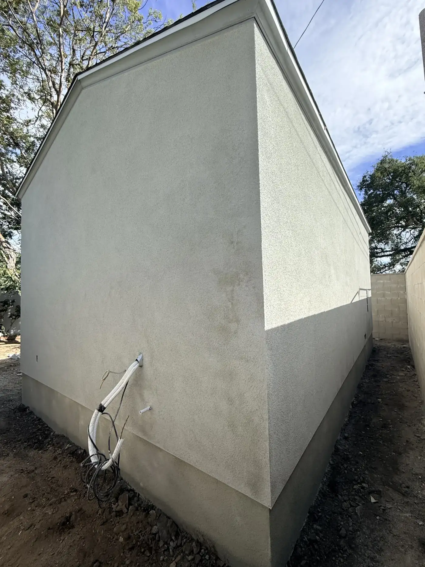 Fresh exterior stucco on the finished structure at PMK Development's Mt. Curve Avenue project in Altadena.