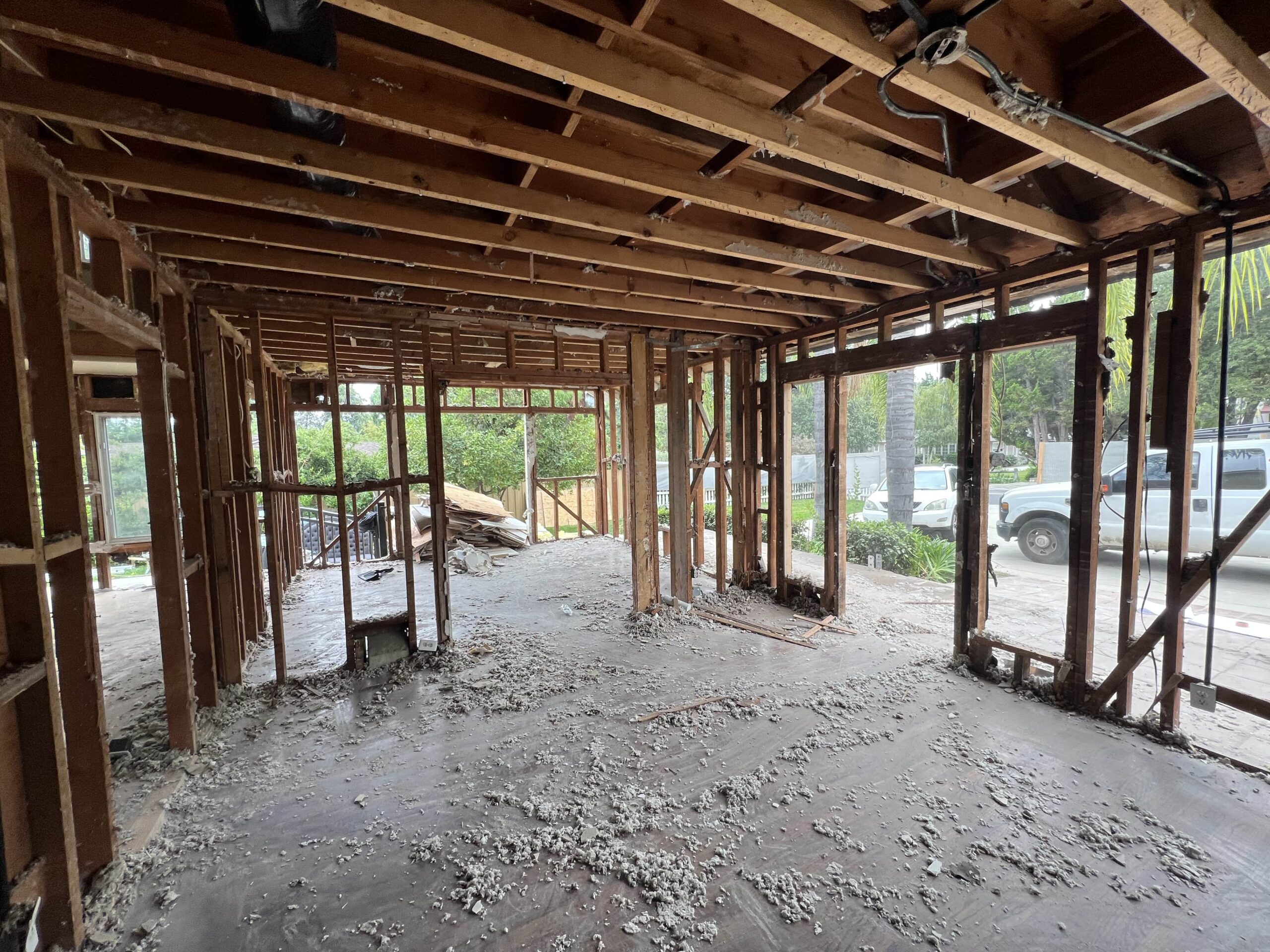 IMG_2023 Contractor reviewing renovation progress at occupied Fairfax hillside home