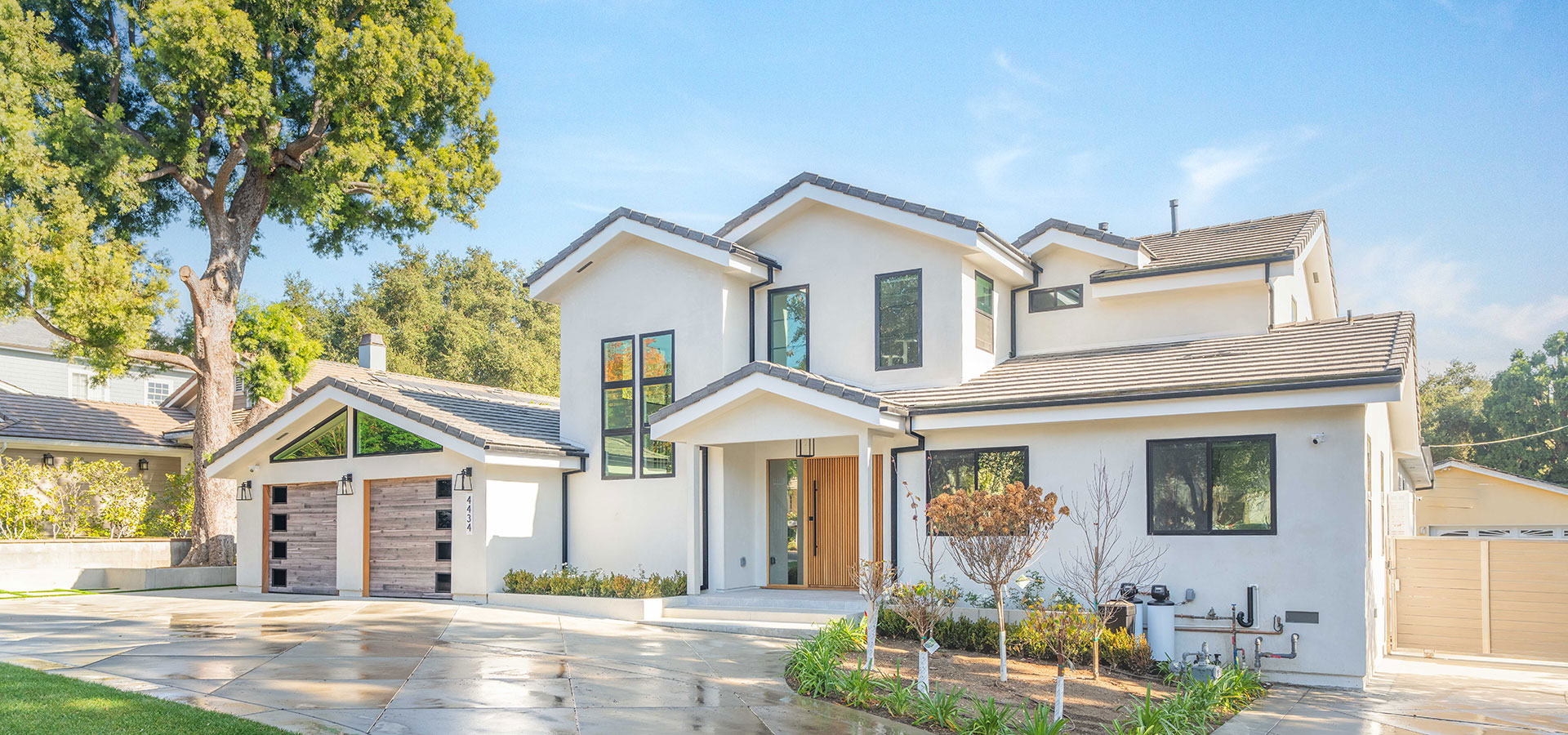 home Experienced contractor reviewing luxury home renovation plans and finish specifications